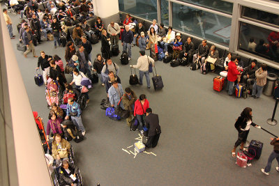 Boarding Area weighing of cabin baggage for PR115