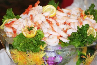 BOWL OF ICE FILLED WITH SHRIMP