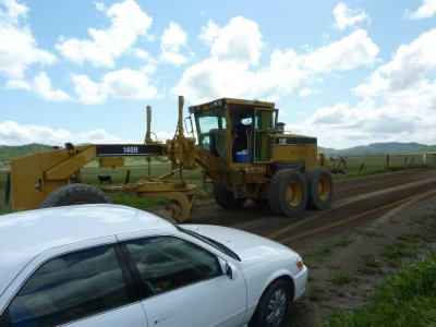 making our dirt road good.