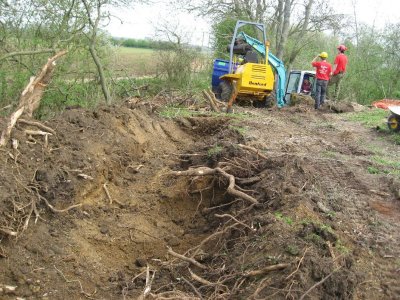 Excavating a hole for the dredgings