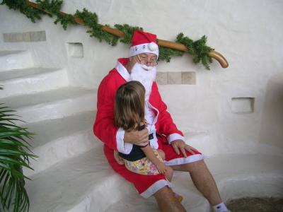 A little girl in so excited to see Santa