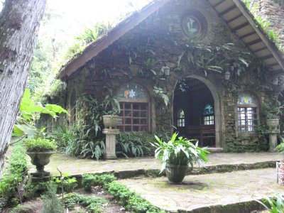 the chapel with plants growing out of the wall