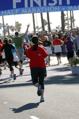 Emily finishing half marathon