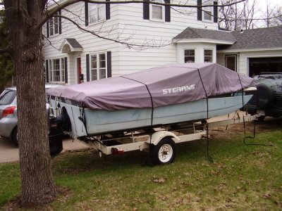 Plenty of straps... bungy cords were used for the summer covers and poly tarp over the whole thing