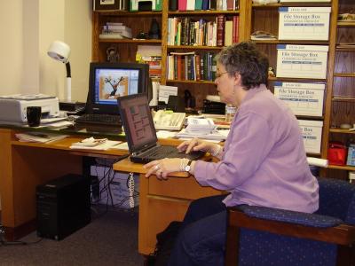 Joan Using the Convertible Desk Station.JPG