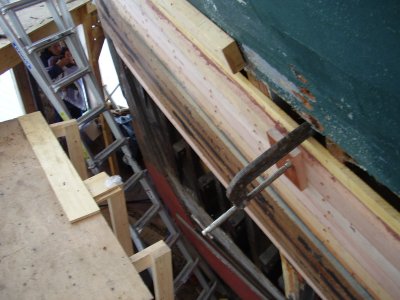 Looking down from the walkway at the open prow and access ladder... note that Joanie is down below holding baby Isaac.