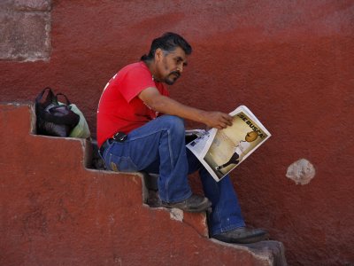 Reading Newspaper San Miguel Steps