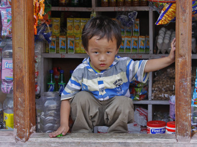 Boy in Store Window