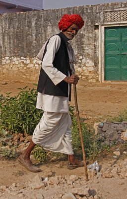 Man Walking with Cane
