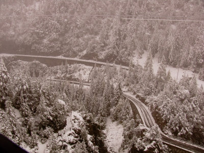 From the Berina Express showing the line behind us below.JPG