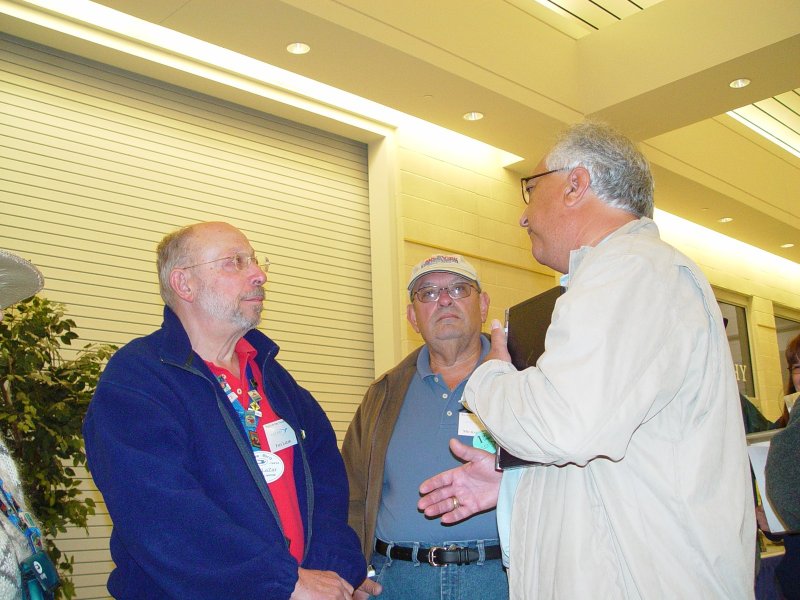 L to R PAUL LAZAR, MIKE BRODY AND MACY NESHATI DISCUSSING HOW TO GET MORE POWER FROM A DETROIT DIESEL