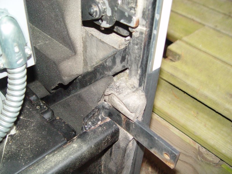 THE LEFT SIDE  DOOR FRAME IS ATTACHED TO THE DRAWER WITH THESE BRACKETS WHICH ALSO HAVE THE DRAWER LOCK TABS