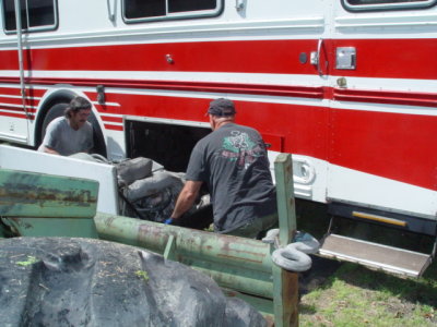 WITH THE AID OF THE BIG GREEN FORKLIFT THE POWERTECH IS INSERTED ON THE DRAWER RAILS