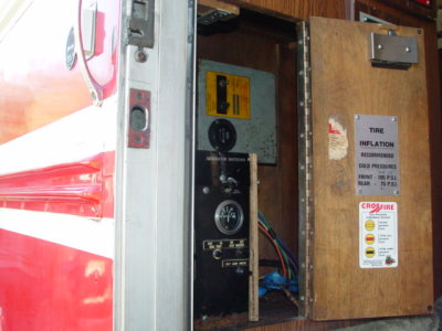 THE GENERATOR CONTOL PANEL IS NOW LOCATED ABOVE THE POWER TRANSFER SWITCH