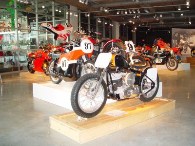 THIS MODEL OF HARLEY IN THE FOREGROUND WAS USED FOR YEARS ON FLAT TRACKS, IT WAS VERY FAST