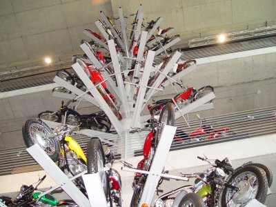 SOME OF THE BIKES WERE ON A FLOWER TYPE CONFIGURED DISPLAY THAT SPANNED ALL SIX FLOORS