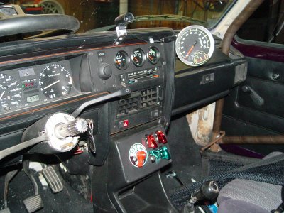 I'VE ADDED NEW VDO GAUGES, COVERED SWITCHES, MASTER BATTERY KILL SWITCH, SHIFT LIGHT AND A TELL TALE TACHOMETER