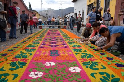 Alfombras or carpets are made from flowers, fruits, and colored sawdust pressed into elaborate stencils