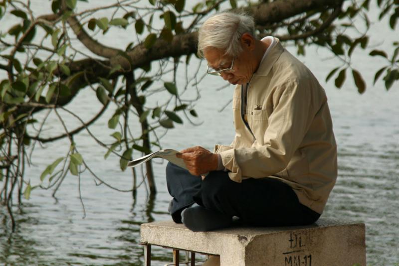 Reading at Hoan Kiem Lake