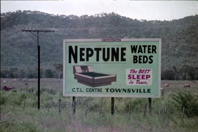 Neptune Waterbeds Billboard near Townsville, Australia. 1970's
