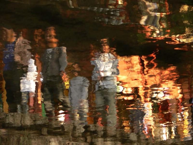 Reflected tourists, Old Town, Lijiang, China, 2006