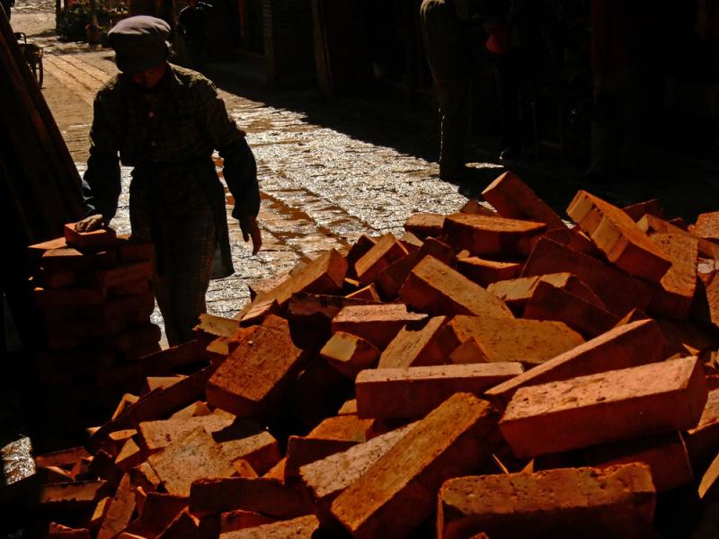 Brick carrier, Shuhe, China, 2006
