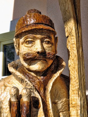 Mountain meeting with a wooden gentleman