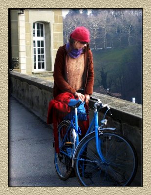 A girl and her blue bike