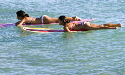 surfer girls on waikki beach