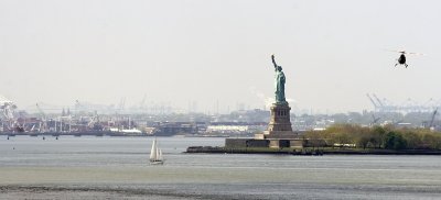 statue of liberty from the brooklyn bridge