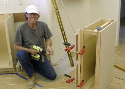 KENNY setting cabinets