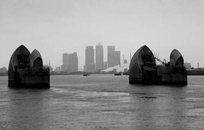 Thames barrier, The Dome and the Docklands skyline..