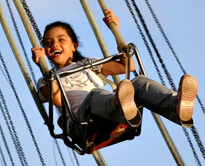 Hannah on the swings