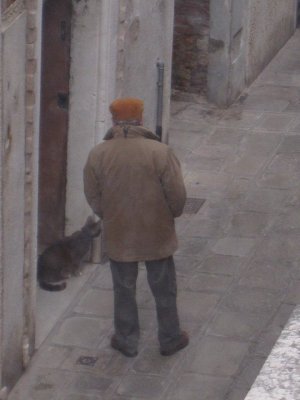 Man taking his cat out for the morning