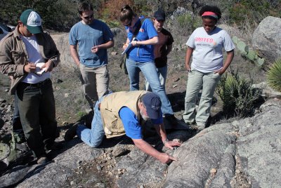Dr. Gary R. Lowell explaning the Big Branch Gneiss