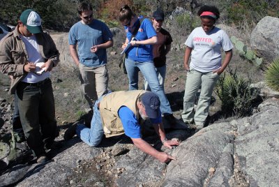 Dr. Gary R. Lowell explaning the Big Branch Gneiss
