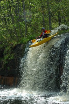 Kayaker Going Over Wolf Creek Falls