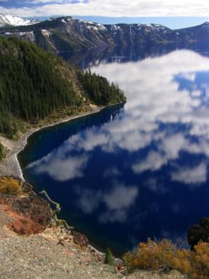 Deep blue water and clouds on north rim