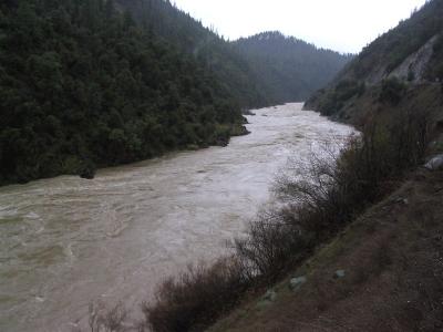 Klamath River at flood stage in canyon below Happy Camp