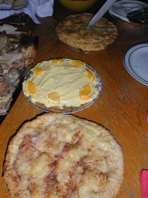 apple pies and  a rum-butter frosted pumpkin pie