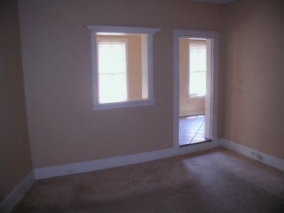 View of Living Room with Pass Through and Entry To Kitchen