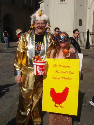 SIX FOOT MAN EATING CHICKEN AND THE BEAUTIFUL HANDLER CASS 