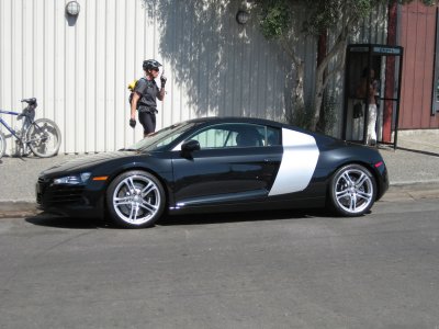 Jim standing next to a 2008 Audi R8