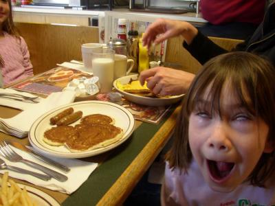 Hannah making one of her favorite faces at George Webbs