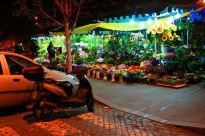 A scooter and flower stall