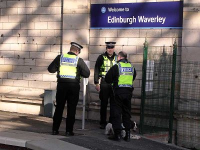 Train station in Edinburgh and bomb sniffing dog.