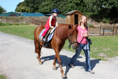 sarah leading Risn's pony