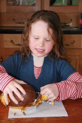 Isabel deconstructing Easter Egg