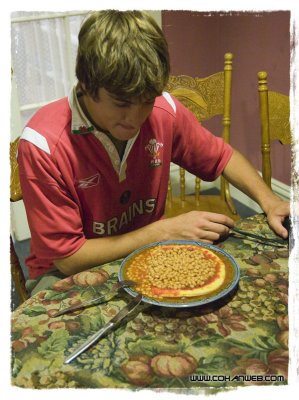 We all make important decisions in life. This bloke decided to have a baked bean pizza for dinner.