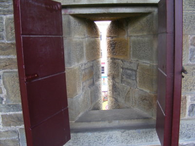 My smallest window yet, for shooting arrows out of Cardiff Castle, Wales.JPG